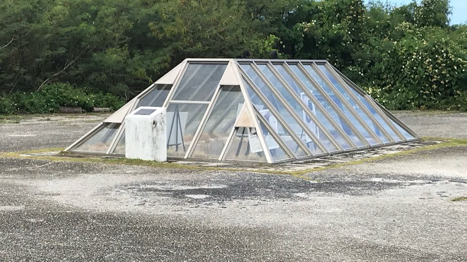 An enclosure covers the pit at North Field, Tinian, from which an atomic bomb was loaded on a B-29 bomber for the bombing of Hiroshima in August 1945. - Brad Lendon/CNN