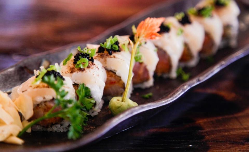 A Dom Julio roll with yellowtail and scallop, topped with squid ink tobiko from Safu Sushi in Toms River.