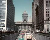 <p>Cars make their way through traffic as they head up Park Avenue and through the Grand Central Station passage. </p>