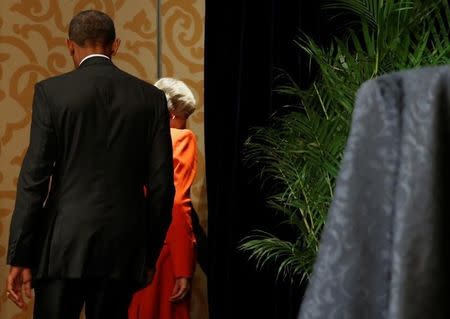 U.S. President Barack Obama (L) and Britain's Prime Minister Theresa May depart after speaking to reporters following their bilateral meeting alongside the G20 Summit, in Ming Yuan Hall at Westlake Statehouse in Hangzhou, China September 4, 2016. REUTERS/Jonathan Ernst