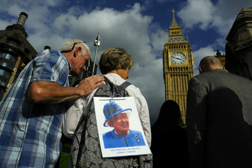 People leave the Westminster Hall after paying their respect to the late Queen Elizabeth II during the lying-in-state, in London, Thursday, Sept. 15, 2022. The Queen will lie in state in Westminster Hall for four full days before her funeral on Monday Sept. 19. in London, England, Thursday, Sept. 15, 2022. (AP Photo/Petr David Josek)