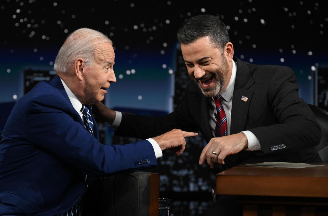 President Biden speaks with host Jimmy Kimmel as he makes his first in-person appearance on 