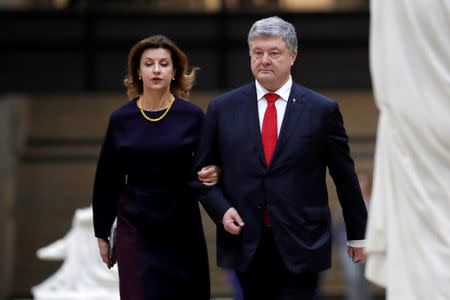 Ukrainian President Petro Poroshenko and his wife Maryna Poroshenko arrive at the official dinner at the Orsay Museum, as part of the commemoration ceremony for Armistice Day, 100 years after the end of the First World War, in Paris, France, November 10, 2018. Ian Langsdon/Pool via REUTERS