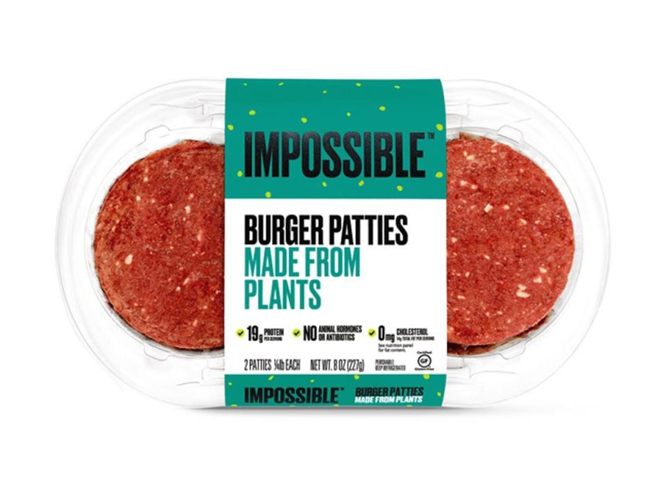 Clear, blue, and white package of Impossible burgers from Aldi