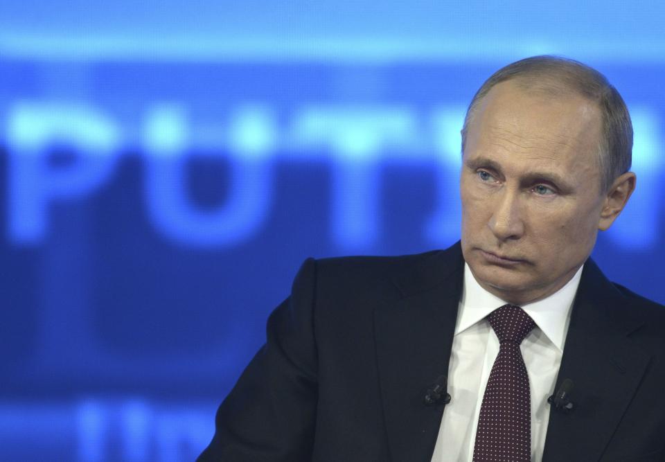 Russian President Vladimir Putin takes part in a live broadcast nationwide phone-in in Moscow