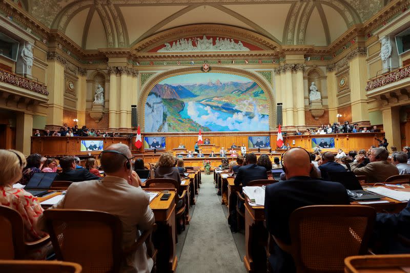 Ukraine's President Volodymyr Zelenskiy addresses Swiss Parliament via video message, in Bern