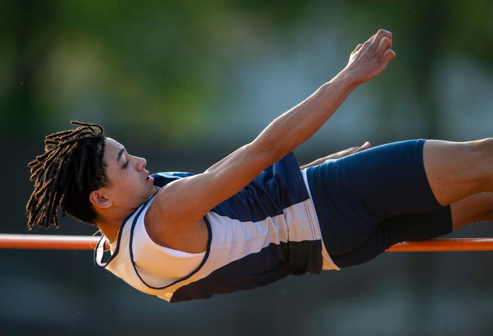 Reitz Donovan Moore clears the bar in the high jumb during the 2023 IHSAA Boys Regional Track and Field meet at Central High School in Evansville, Ind., Thursday, May 25, 2023.