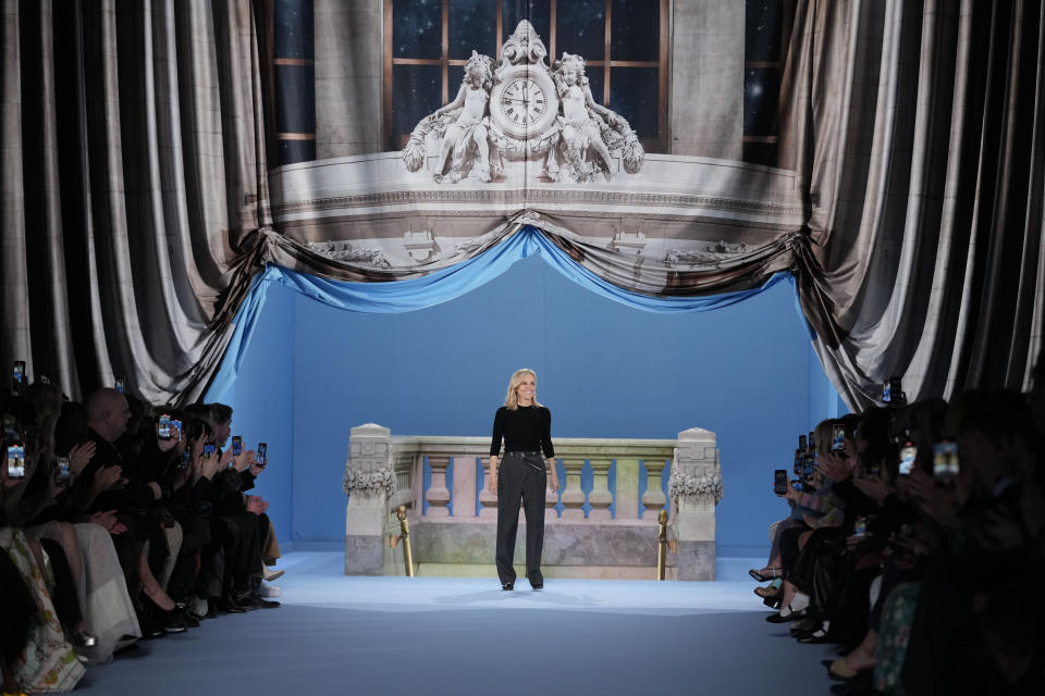 Designer Tory Burch acknowledges the audience applause after her collection was presented during Fashion Week, Monday, Feb. 13, 2023, in New York. (AP Photo/Mary Altaffer)