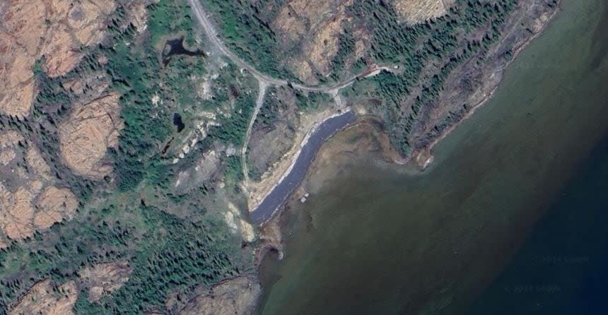 Satellite imagery from Google Earth shows the foreshore tailings in the summer of 2023. Plato said they were covered years ago, but some of the tailings are exposed. The remediation plans to cover them completely, starting in 2028. 