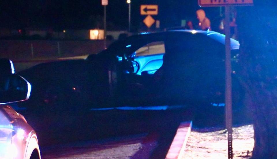 A vehicle sits after crashing into a center divder following a shooting at a nightclub in Fresno, California on Saturday, March 25, 2023. Two people were detained.