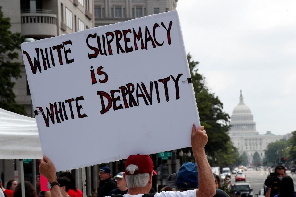 On the first anniversary of the "Unite the Right" rally in Charlottesville, Va., protesters rally in Washington, D.C., on Aug. 12, 2018.