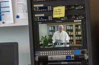 Pope Francis is seen on a video screen at United Nations headquarters as he speaks in a pre-recorded message addressing the 75th session of the United Nations General Assembly the 75th session of the United Nations General Assembly, Friday, Sept. 25, 2020, at U.N. headquarters. (AP Photo/Mary Altaffer)
