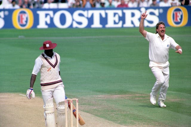 Ian Botham celebrates one of his 383 Test wickets 