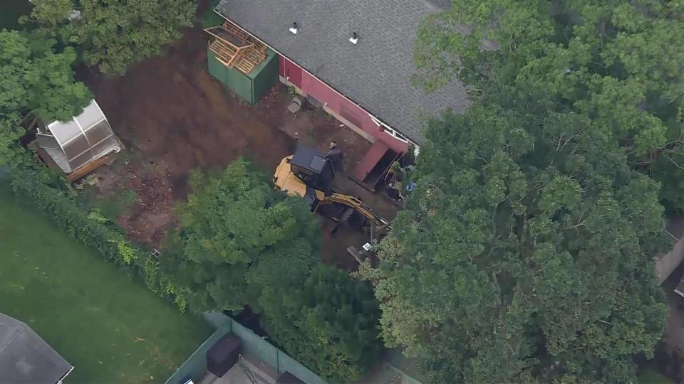 An excavator is seen at the home of Rex Heuermann.. According to law enforcement sources, investigators are looking into whether any victims may have been killed at the house. / Credit: CBS New York