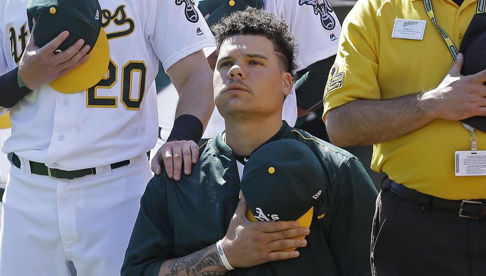 A's catcher Bruce Maxwell says he'll stand for the national anthem this year. (AP)