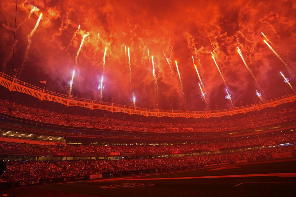 New York Yankees fans enjoy a pyrotechnics display after a baseball game against the Baltimore Orioles, Monday, July 3, 2023, in New York. (AP Photo/Frank Franklin II)