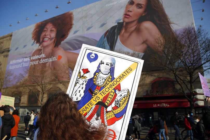 Women and activists march to mark International Women's Day, in Paris, March 2021