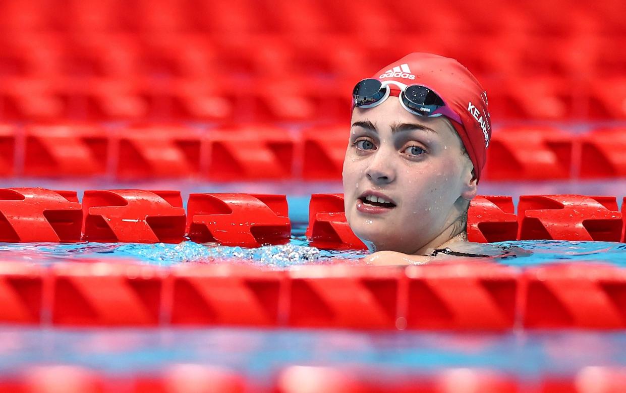 Tully Kearney of Team Great Britain celebrates winning the gold medal after competing in the Women's 100m Freestyle S5 final on day 2 of the Tokyo 2020 Paralympic Games at the Tokyo Aquatics Centre on August 26, 2021 in Tokyo, Japan