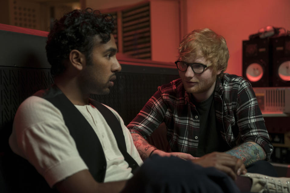 This image released by Universal Pictures shows Himesh Patel, left, and Ed Sheeran in a scene from "Yesterday," directed by Danny Boyle. (Jonathan Prime/Universal Pictures via AP)