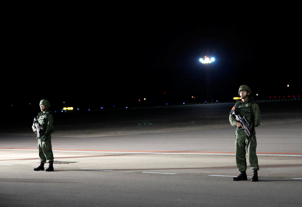 <p>Soldiers stand guard ahead of the arrival of U.S. President Donald Trump at Paya Lebar Air Base in Singapore, before his summit with North Korean leader Kim Jong Un, June 10, 2018. (Photo: Kim Kyung-Hoon/Reuters) </p>