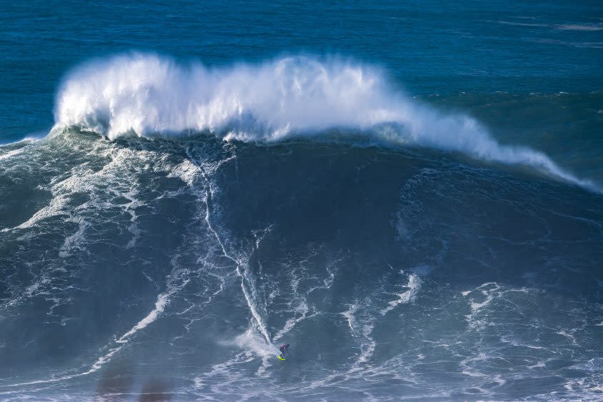 Maya Gabeira surfs at Praia do Norte on January 8, 2022 in Nazare, Portugal - Credit: Octavio Passos/Getty Images