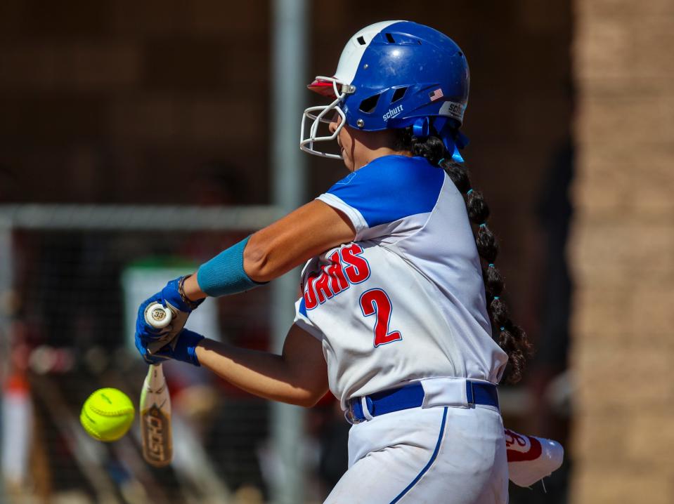 Indio's Carmen Gordillo (2) connects with a pitch hitting a double during their Division 6 CIF-SS quarterfinal game in Indio, Calif., Thursday, May 9, 2024.