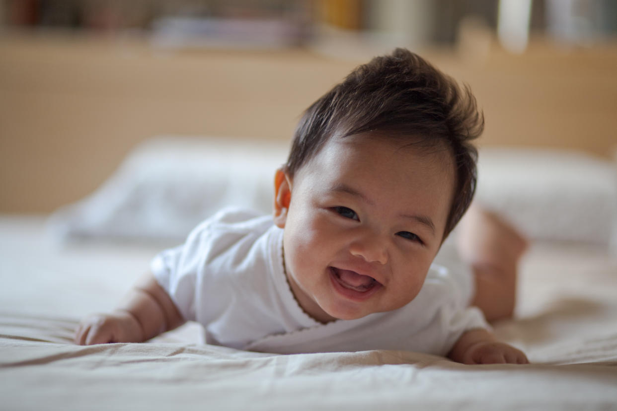 Happy smiling baby girl.