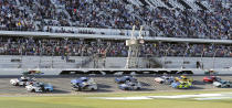 Ryan Newman (6) and Brad Keselowski (2) lead the field on a restart to resume the NASCAR Daytona 500 auto race at Daytona International Speedway, Monday, Feb. 17, 2020, in Daytona Beach, Fla. Sunday's race was postponed because of rain. (AP Photo/John Raoux)