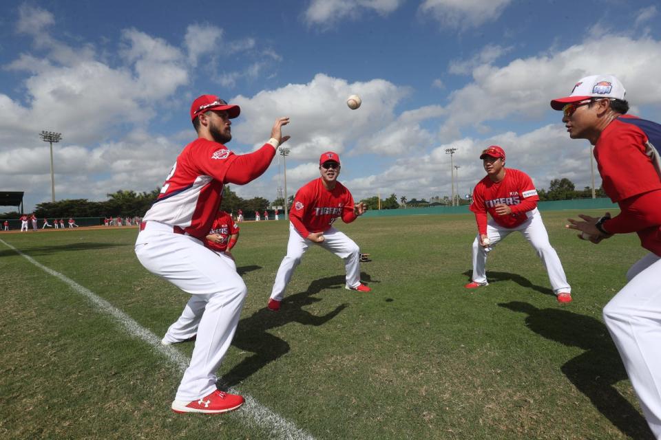 Members of the Kia Tigers participate in a training drill at Terry Park in Fort Myers during their 2020 spring training stay there.