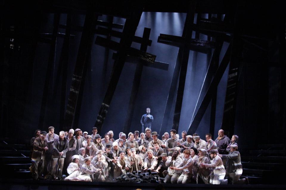 In this undated photo provided by the Houston Grand Opera, a cast performs in the Houston Grand Opera's production of "Don Carlos" in Houston. The Houston Grand Opera is offering the original French-language version and restoring several scenes that are still rarely included. (AP Photo/Houston Grand Opera, Felix Sanchez)