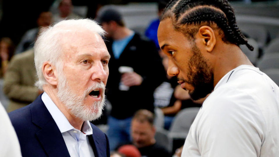 Gregg Popovich and Kawhi Leonard have different definitions of leadership. (Getty Images)