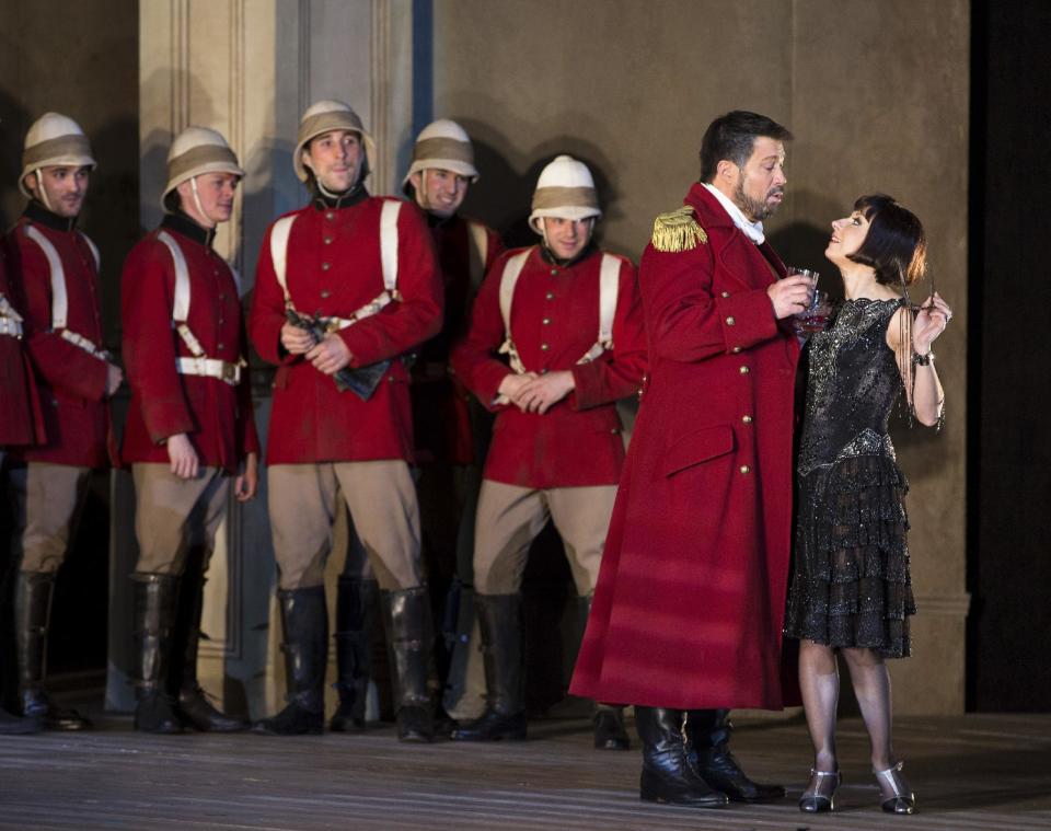 In this March 26, 2013 photo provided by the Metropolitan Opera, Natalie Dessay as Cleopatra, right, and David Daniels as Julius Caesar, second from right, perform during a rehearsal of Handel's "Giulio Cesare." (AP Photo/ Metropolitan Opera, Marty Sohl)