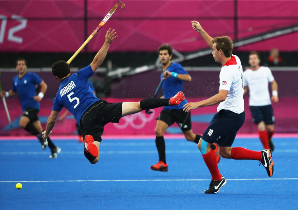 Matt Daly of Great Britain collides with Pedro Ibarra of Argentina during the Men's Hockey Match between Great Britain and Argentina on Day 3 of the London 2012 Olympic Games at the Riverbank Arena on July 30, 2012 in London, England. (Photo by Daniel Berehulak/Getty Images)