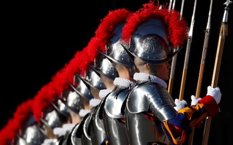 Members of the Swiss Guard were present during the "Urbi et Orbi" message at the Vatican - Credit: REUTERS/Max Rossi