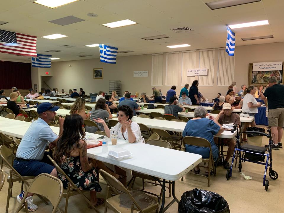 Greek flags and an American flag hang from the ceiling at the Greek Orthodox Church on West Third Street during the Greek Festival, held last weekend with a buffet-style meal of Greek specialities, live music, and dancing.
