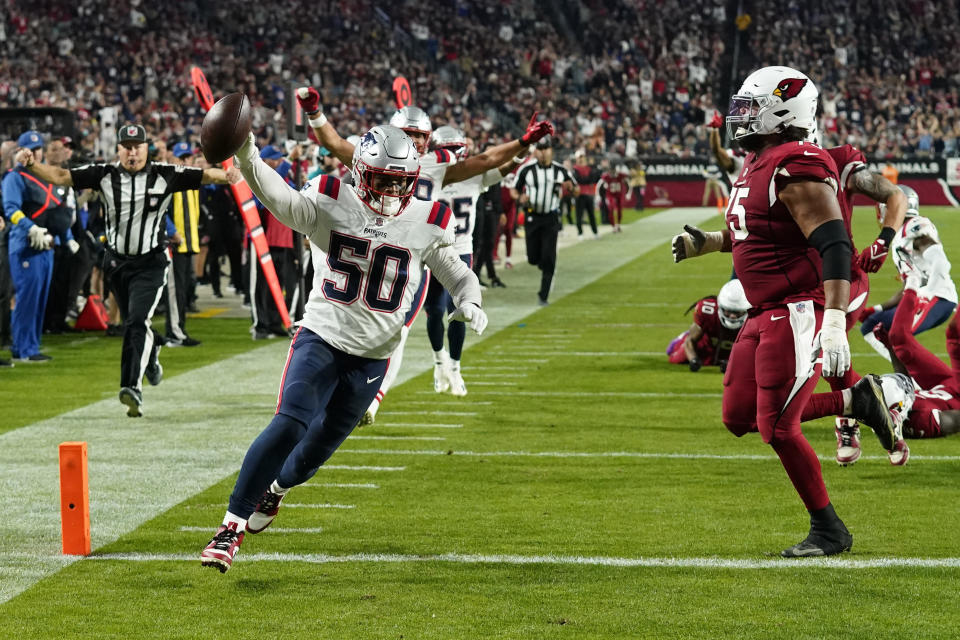 New England Patriots linebacker Raekwon McMillan (50) celebrates after recovering a fumble to score a touchdown against the Arizona Cardinals during the second half of an NFL football game, Monday, Dec. 12, 2022, in Glendale, Ariz. (AP Photo/Ross D. Franklin)