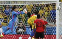 Mexico's goalkeeper Guillermo Ochoa makes a save during the 2014 World Cup Group A soccer match between Brazil and Mexico at the Castelao arena in Fortaleza June 17, 2014. (Sergio Moraes/Reuters)