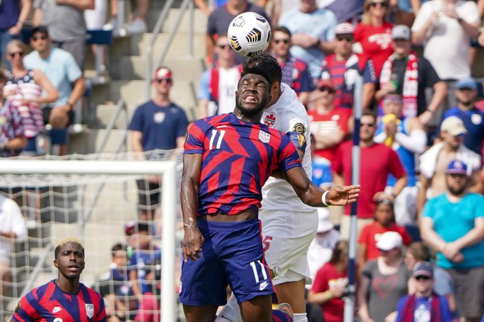 USMNT forward Daryl Dike (11) heads the ball during Sunday's win over Canada.