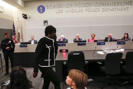 Tritobia Ford, mother of Ezell Ford, walks in front of the commission after speaking about the death of her son during a meeting of the Los Angeles Police Commission in Los Angeles, California June 9, 2015. REUTERS/Patrick T. Fallon