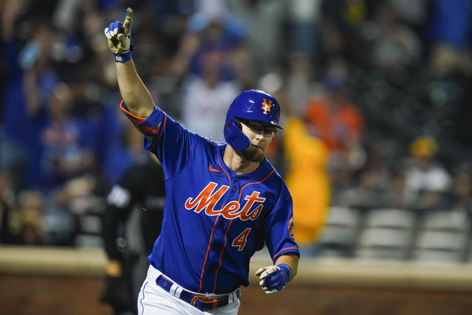 New York Mets' Patrick Mazeika (4) gestures as he runs the bases after hitting a home run during the seventh inning of a baseball game against the Seattle Mariners, Saturday, May 14, 2022, in New York. (AP Photo/Frank Franklin II)