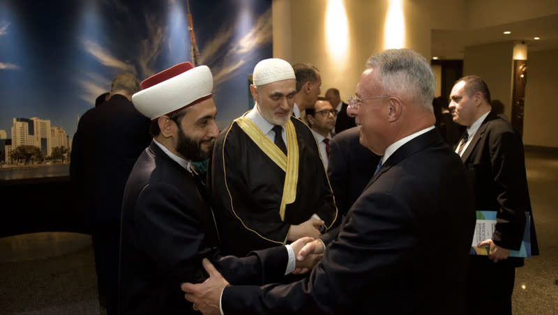 Sheikh Mohamad Al Bukai, left, and Sheikh Jihad Hassan Hammadeh, center, meet with Elder Ulisses Soares of the Quorum of the Twelve Apostles of The Church of Jesus Christ of Latter-day Saints at the Brazilian Symposium on Religious Freedom, Tuesday, Aug. 8, 2023 in Brasília, Brazil.