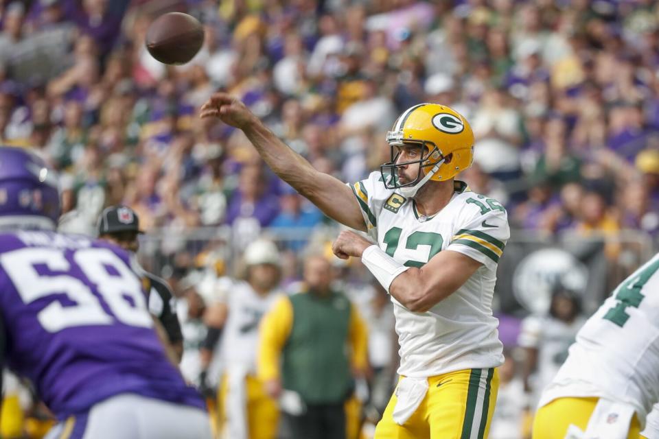 Green Bay Packers quarterback Aaron Rodgers throws a pass.