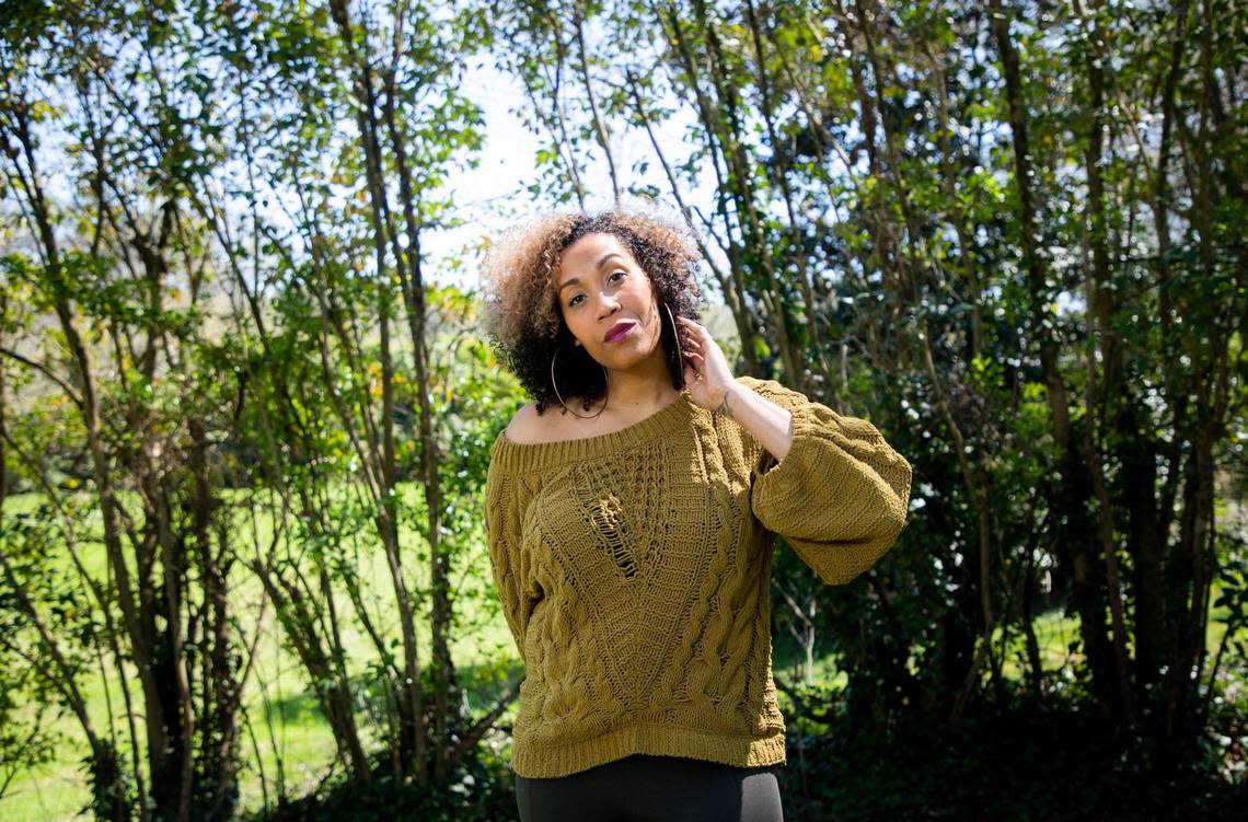 County music artist Rissi Palmer stands for a portrait outside her home, on March 29, 2021, in Durham, N.C. She is host of “Color Me Country,” an Apple Music show in which she spotlights Black, Indigenous and Latinx histories of country music.