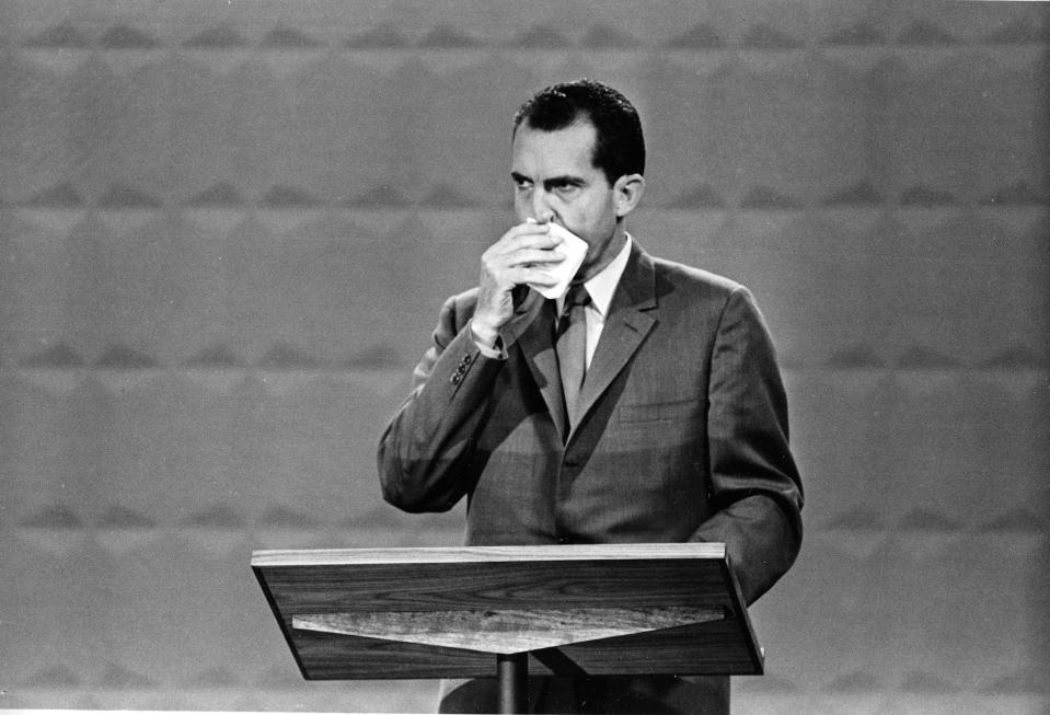 FILE - In this Sept. 26, 1960, file photo U.S. Republican presidential candidate Vice President Richard M. Nixon wipes his face with a handkerchief during the nationally televised first of four presidential debates with Sen. John F. Kennedy, Democratic nominee, in Chicago, Ill., for the first televised debate between presidential candidates in U.S. history. Nixon's profuse sweating on stage with cool-as-a-cucumber rival John Kennedy (not shown) in 1960 proved to be stiff competition in the pantheon of campaign misfires. (AP Photo/File)