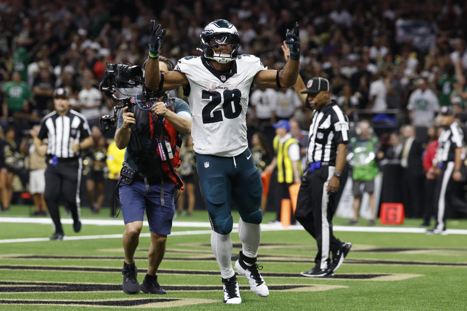 Philadelphia Eagles running back Saquon Barkley (26) celebrates after scoring a two-point conversion against the New Orleans Saints in the second half of an NFL football game in New Orleans, Sunday, Sept. 22, 2024. (AP Photo/Gerald Herbert)