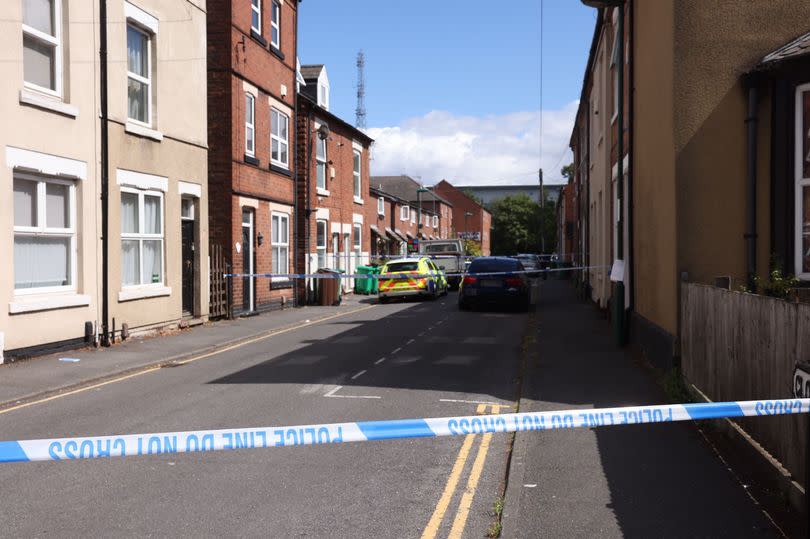 A cordon at the scene in Cloister Street