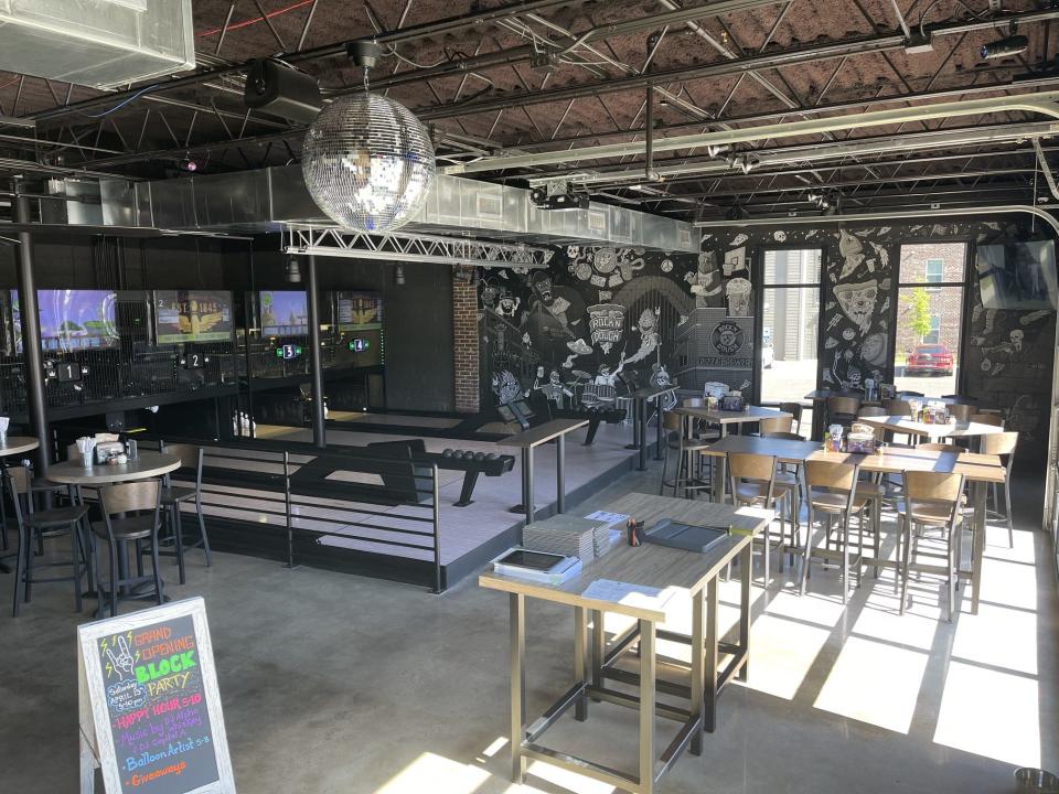 The interior of Rock'n Dough's newest location at 704 Madison Ave. It features a full-size bar and four duckpin bowling lanes.