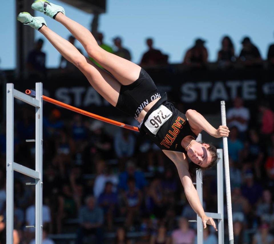 Capital&#x002019;s Hana Moll goes up and over the bar en route to a a state title and new meet record of 14&#x002019; 7&#x00201d; during the second day of the WIAA state track and field championships at Mount Tahoma High School in Tacoma, Washington, on Friday, May 26, 2023.