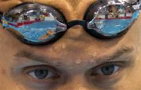 Canadian swimmer Brent Hayden does kicking drill during a training session for the London 2012 Olympics in London, Friday July 27, 2012. (AP Photo/The Canadian Press, Frank Gunn)