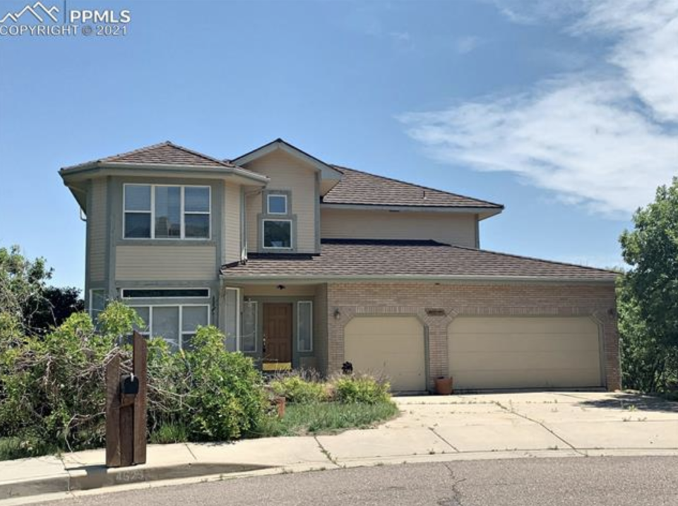 The outside of the five-bedroom, four-bathroom two storey family home.